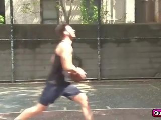 Two basket players play with their balls