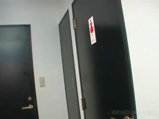 Asian Teen seductress films Twat While Pissing In A Toilet