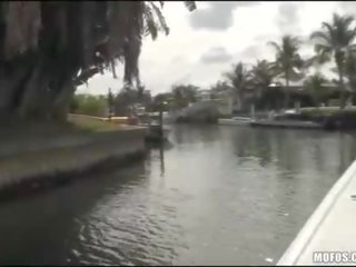 Dude clips his sunbathing GF off a boat