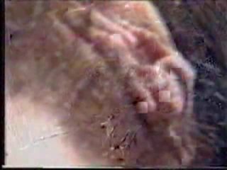Turned on Romanian fingering her hairy pussy in a car video