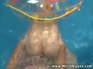 Asian seductress getting pussy pounded in pool and loves it
